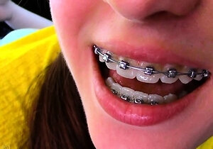 Small titted brunette teen fingering on the bed