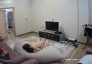 Cute teen masturbates on the couch on hidden cam