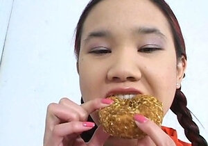 Small titted asian beauty giving blowjob