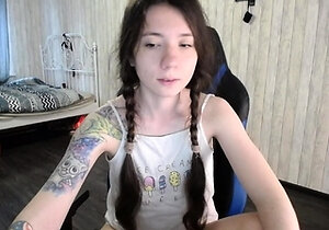 Small titted brunette teen fingering on the bed