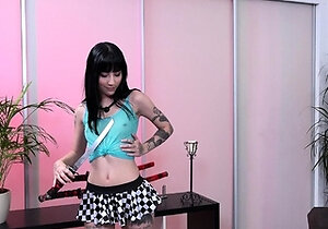 Small titted brunette Sharron with glasses masturbates