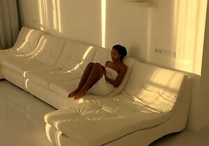 Black Asian Teen jumping on red cock in white room