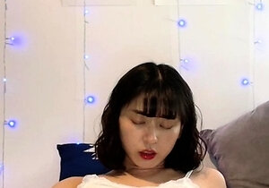 Horny japanese teen satomi stuffs herself with toy