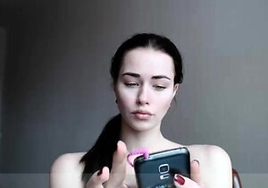 Beautiful teen brunette Jessica Sinn masturbates