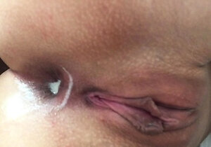 Small titted brunette teen fingering on the bed