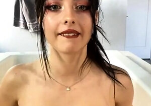 Busty curly brunette with big boobs fucks on couch