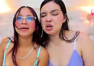 Two brunette lesbian teen girls playing